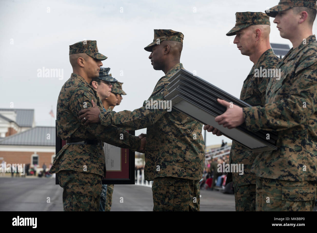 U.S. Marine Corps Gunnery Sgt. Juan Aguilera, left, drill instructor