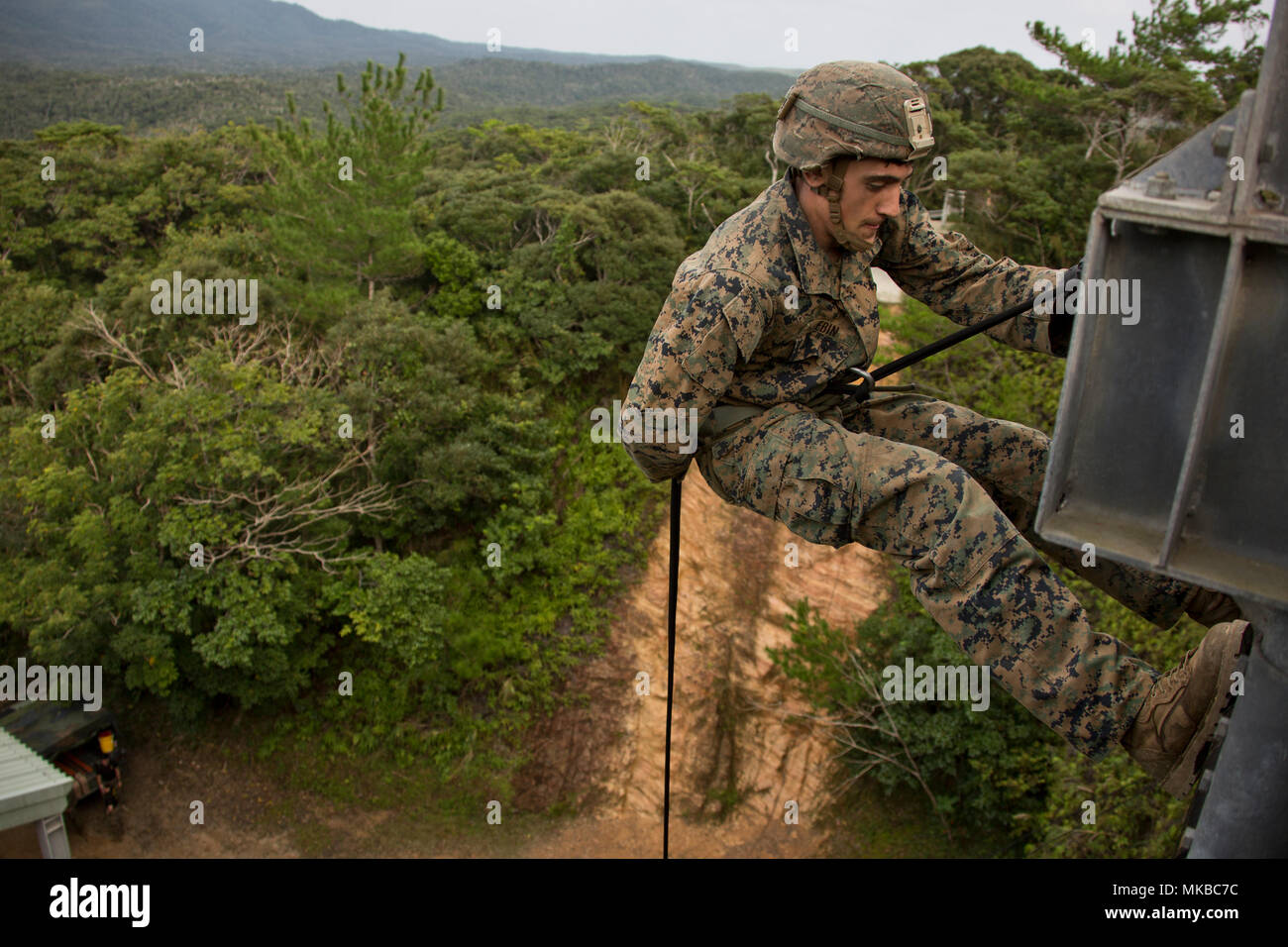 A Us Marine With 3rd Reconnaissance Company 4th Marine Division Practices Rappelling During