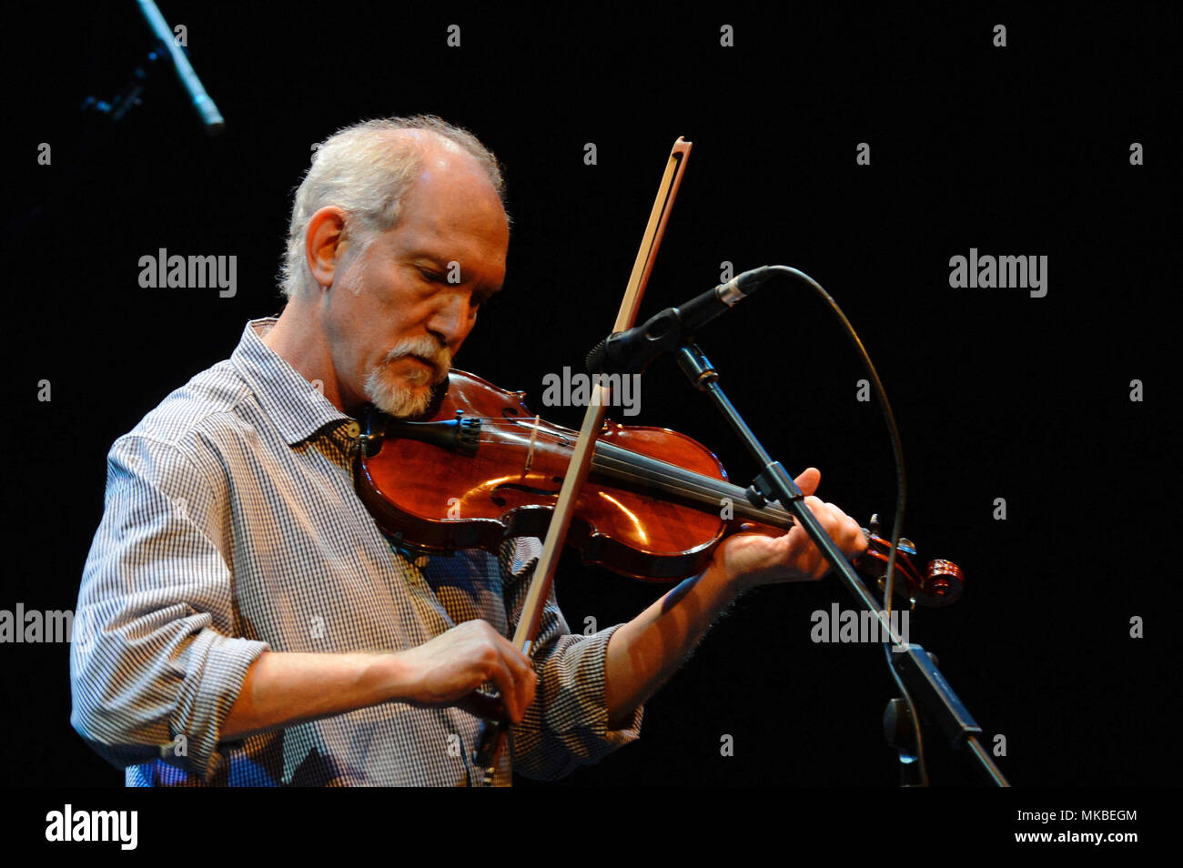 Bruce Molsky is an American fiddler, banjo player, guitarist, and singer. He primarily performs