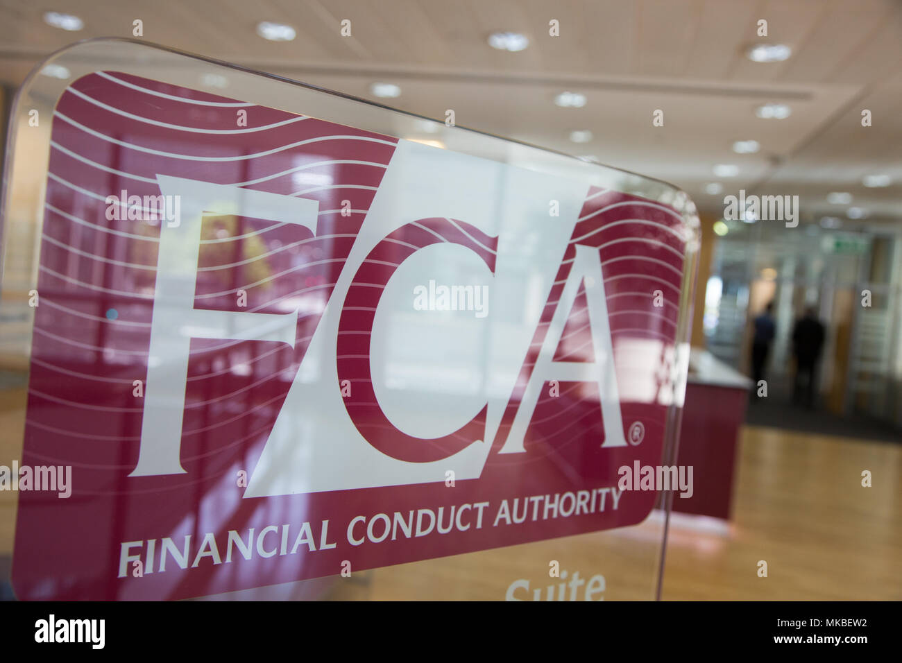 Financial Conduct Authority (FCA) offices, North Colonnade, Docklands, London. Upstairs reception showing corporate logo Stock Photo