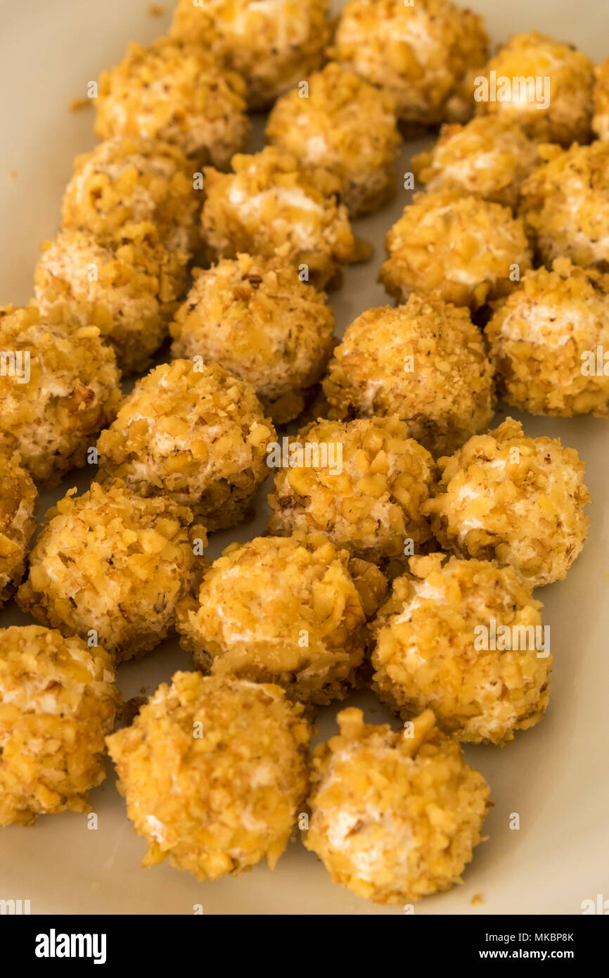 Seedless white grapes coated in white cream cheese and hazelnut crumbs