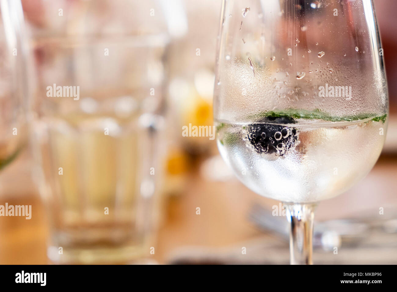White sherry with lemonade, mint leaf and blueberry, rebujito, refreshing low alcohol drink Stock Photo