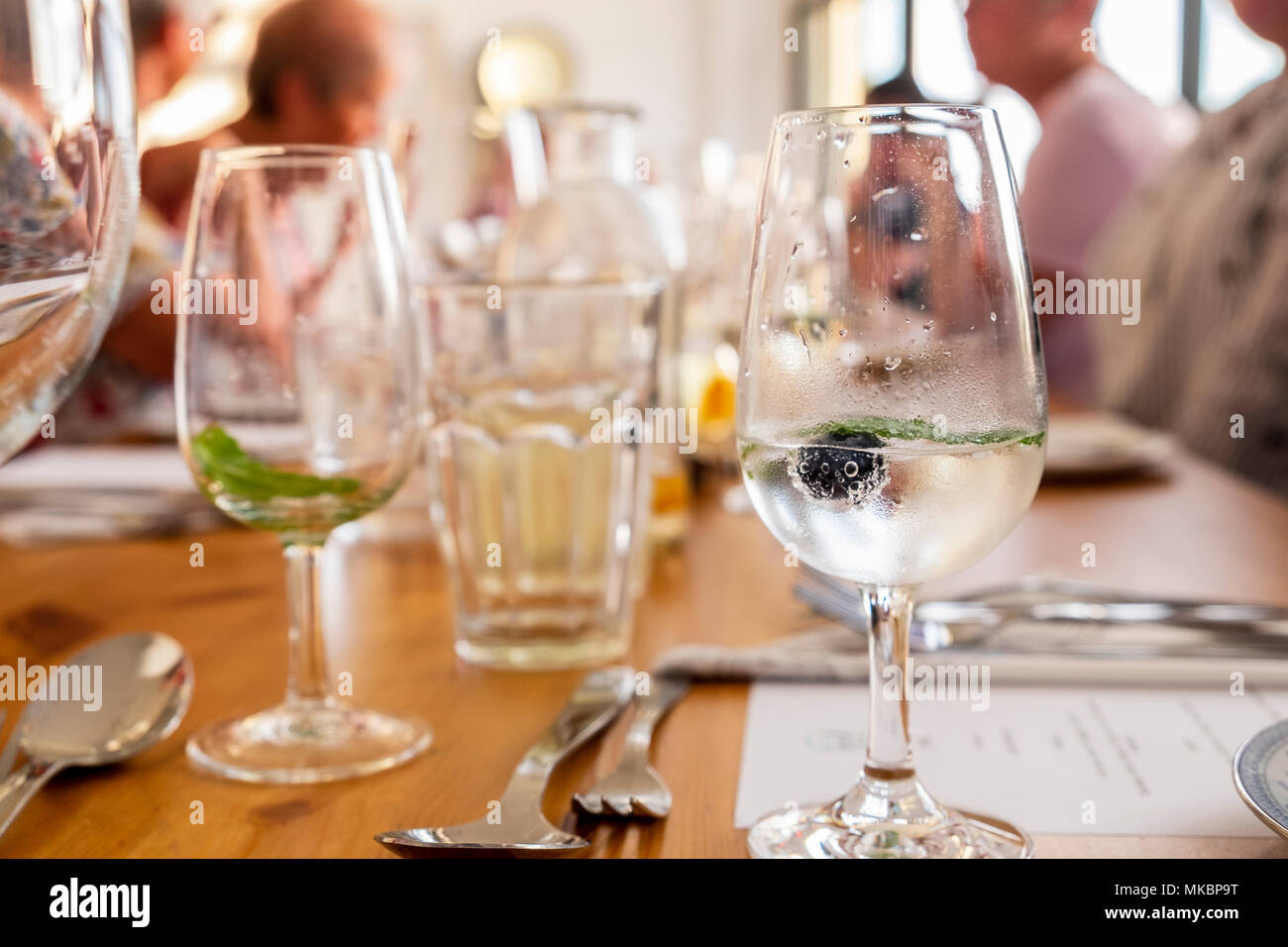 White sherry with lemonade, mint leaf and blueberry, Stock Photo