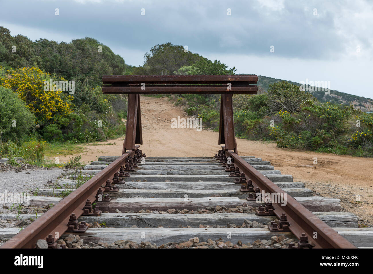 buffer at the end of the railroad from olbia to golfo aranchi Stock Photo