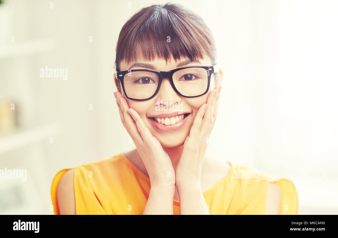 happy asian young woman in glasses at home Stock Photo