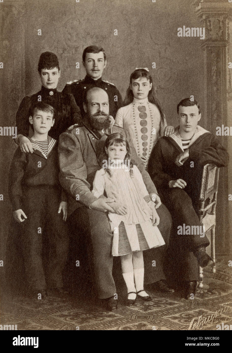 Russian Czar Alexander III and his family, including future czar Nicholas II in the rear,1890s. Photograph Stock Photo