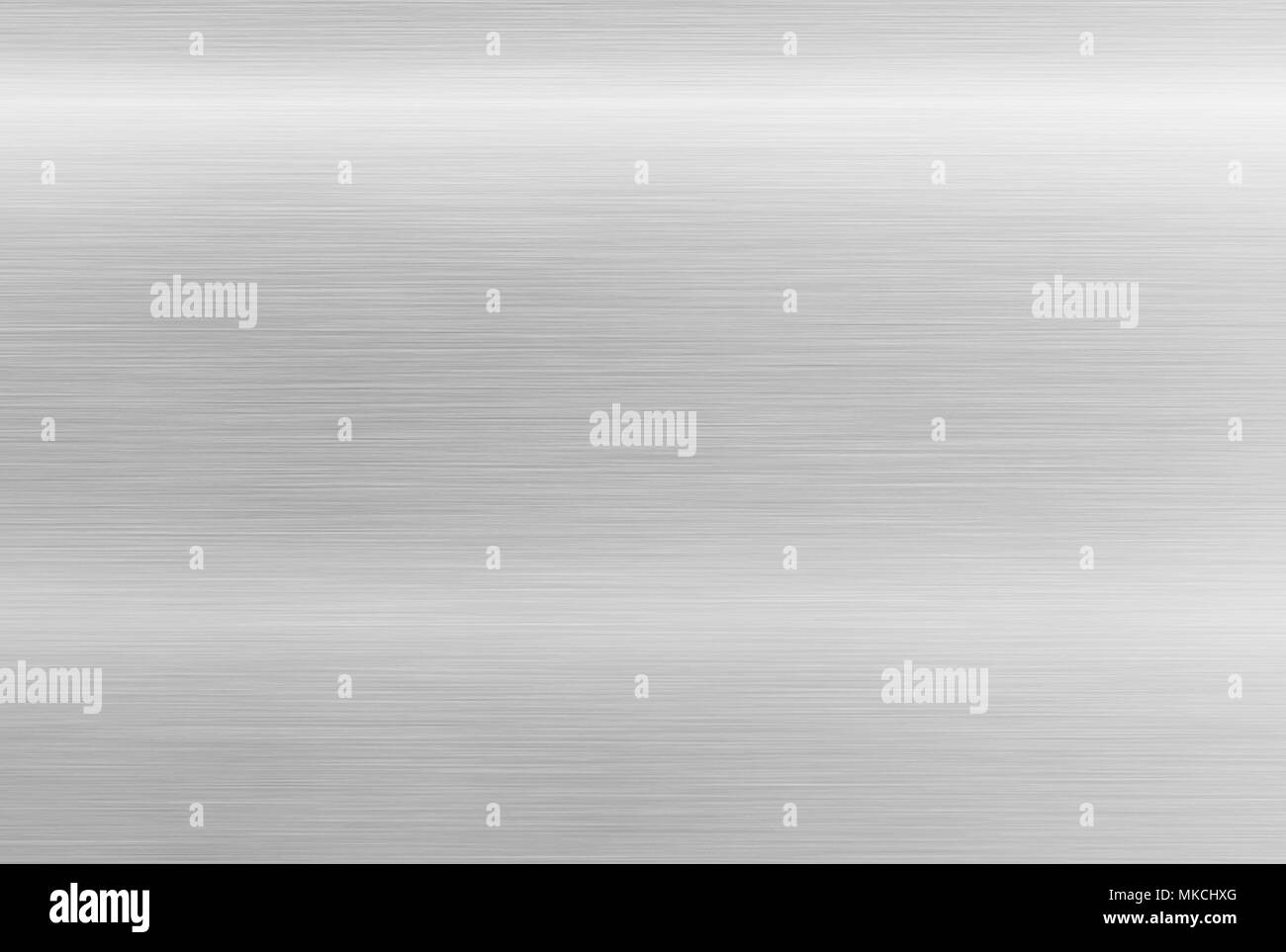 Grey metal background. Stainless steel texture. Polished aluminum Stock