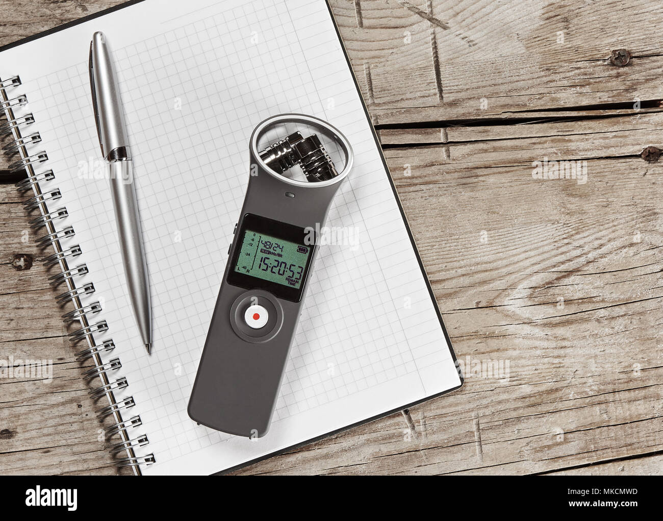 audio recorder with external microphone and notepad. Make notes. Blogging concept Stock Photo