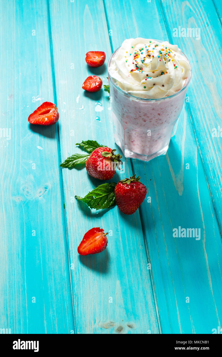 Strawberries milk shake and fresh fruit strawberry. Cocktail with milk