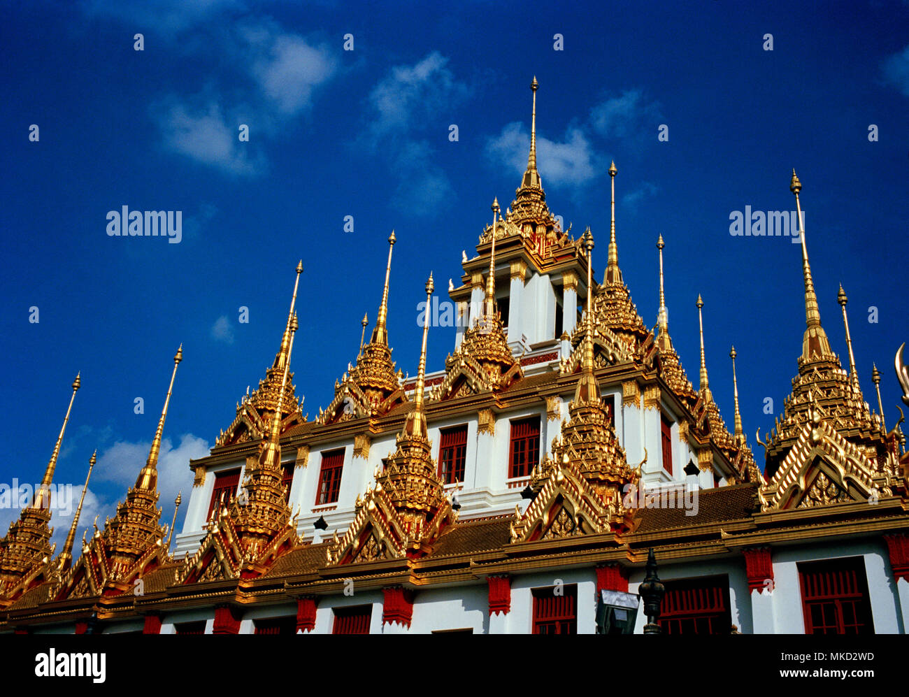 Thai Buddhism - Spires of the Buddhist temple Loha Prasat Metal Castle of Wat Ratchanadda in Bangkok in Thailand in Southeast Asia Far East. Travel Stock Photo