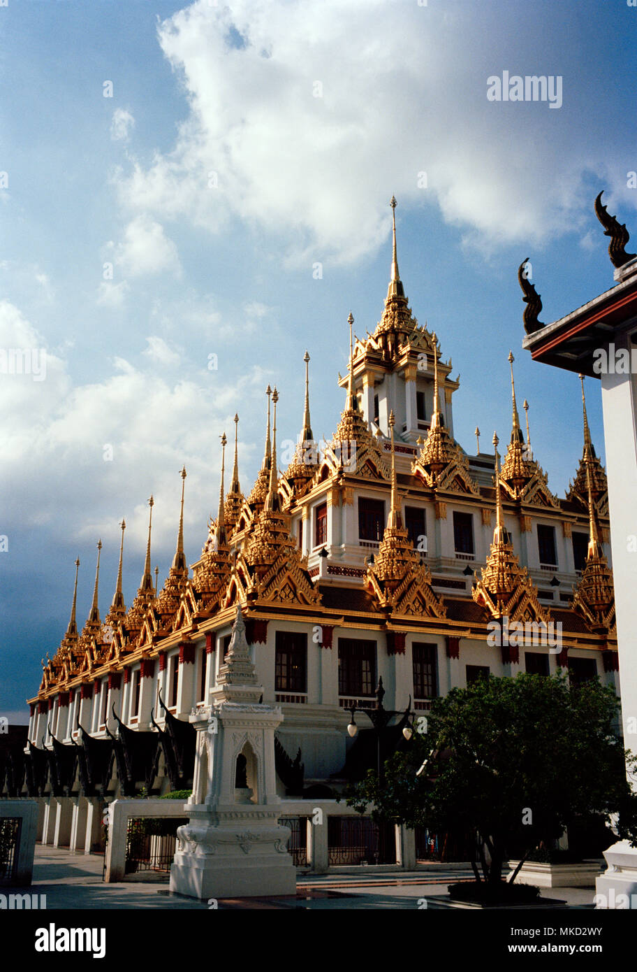 Thai Buddhism - Spires of the Buddhist temple Loha Prasat Metal Castle of Wat Ratchanadda in Bangkok in Thailand in Southeast Asia Far East. Travel Stock Photo