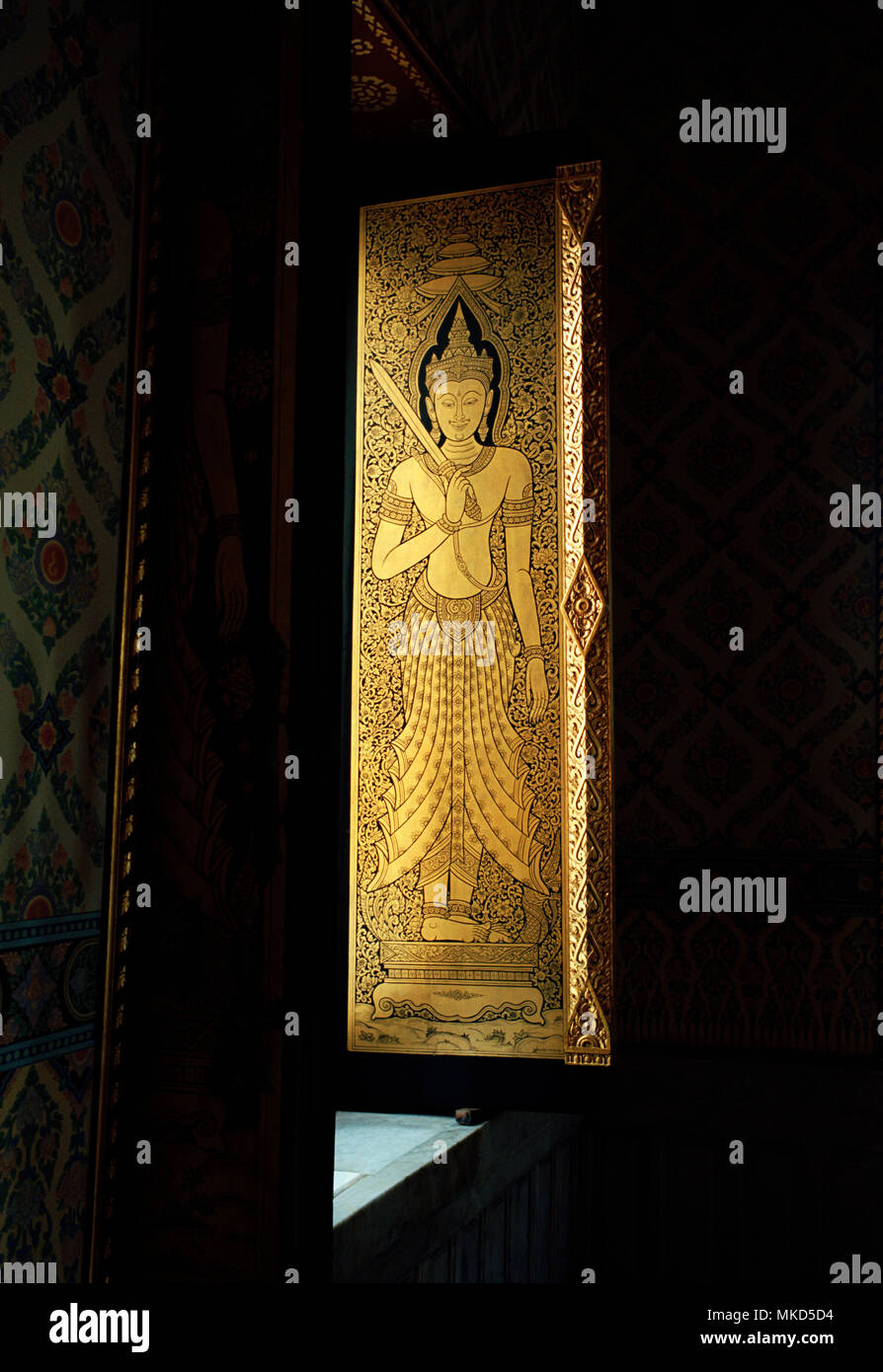 Thai Art - Sacred Buddhist art in Wat Traimit in Bangkok in Thailand in Southeast Asia Far East. Buddhism Beauty Serenity History Light Travel Stock Photo