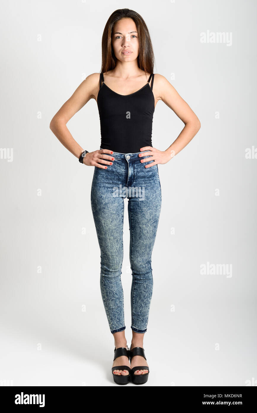 Woman wearing tight blue jeans hi-res stock photography and images - Alamy