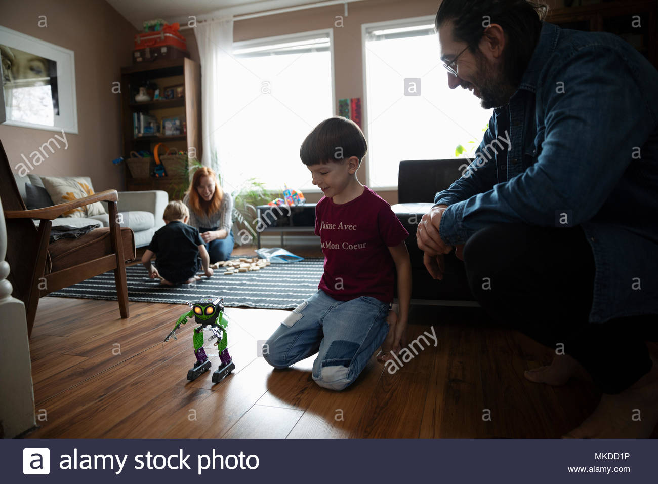 Father son robot toy together hi-res stock photography and images - Alamy
