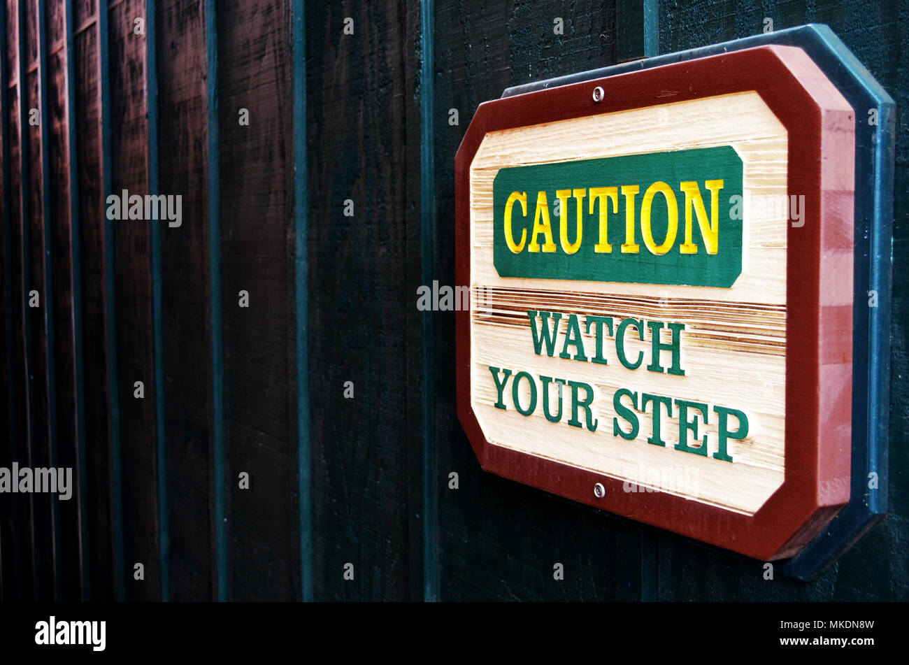 Be careful. Watch your step sign. Stock Photo