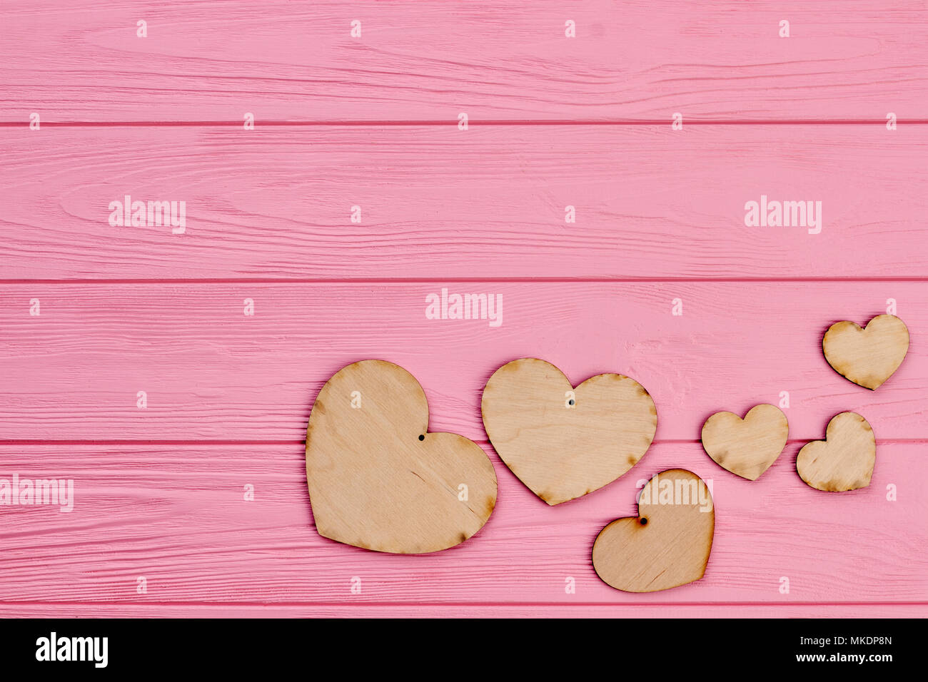 Set of plywood hearts and copy space. Brown rustic hearts made from ...
