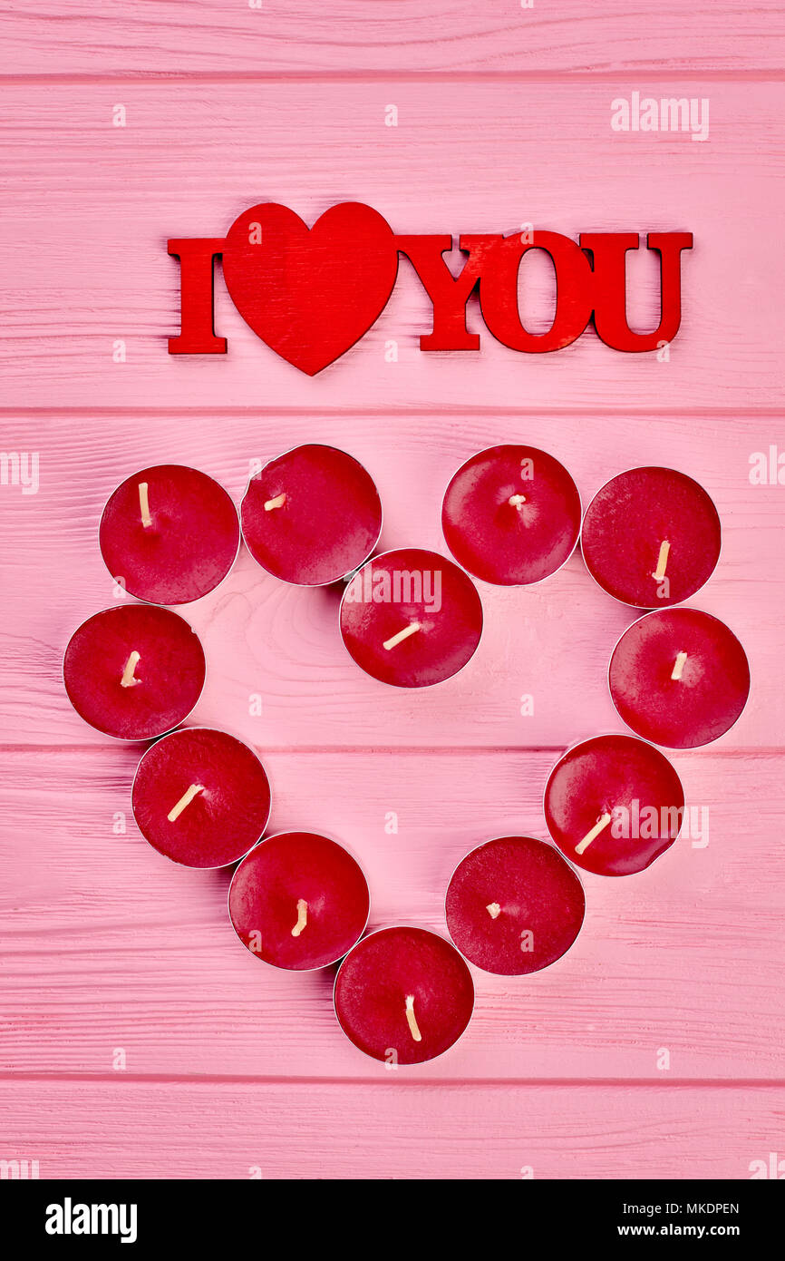Text I love you and candles. Heart from red tea light candles and  decorative inscription I love you, top view. Ideas for greeting with  Valentines Day Stock Photo - Alamy