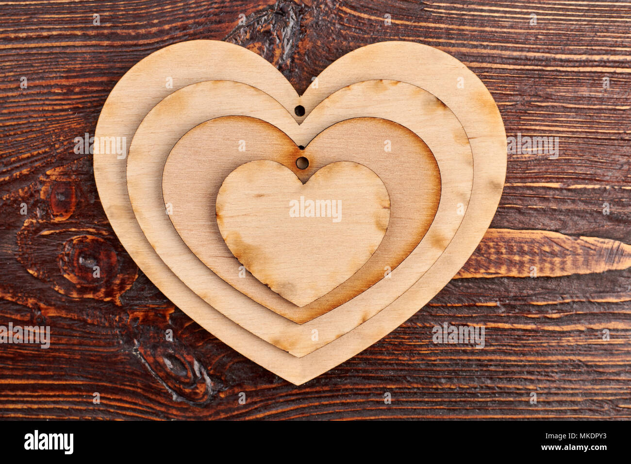 Wooden heart tags, top view. Decoupage wooden hearts shapes. Wooden