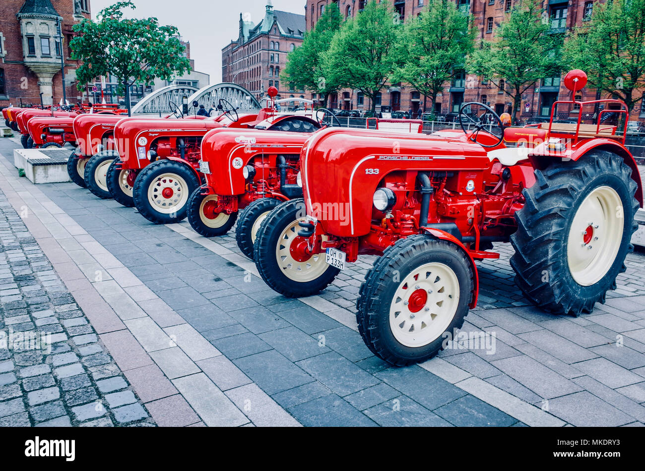 Porsche Diesel Tractors lined up in a display in the HafenCity port area of Hamburg Stock Photo
