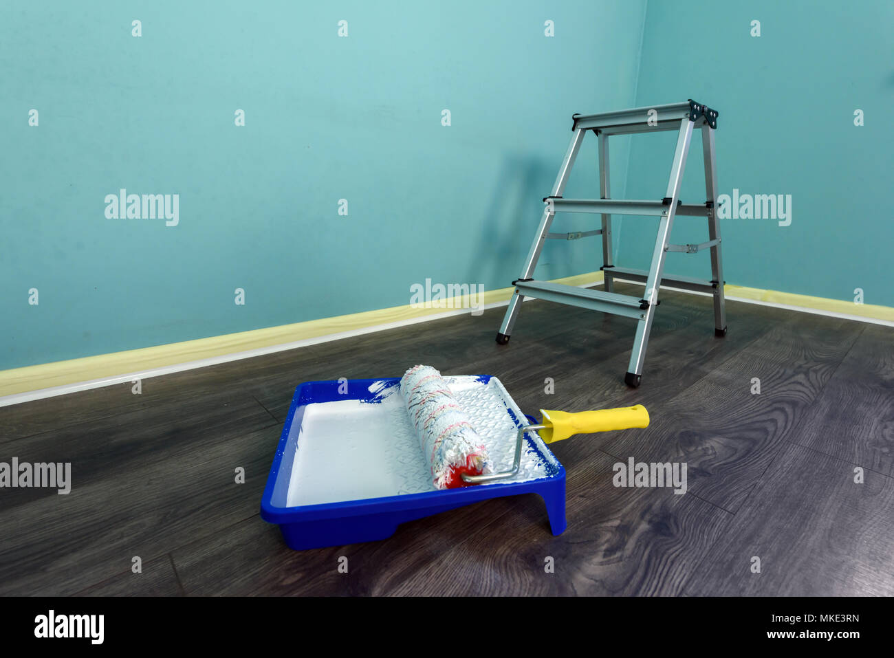 Painting tools on wall background Stock Photo