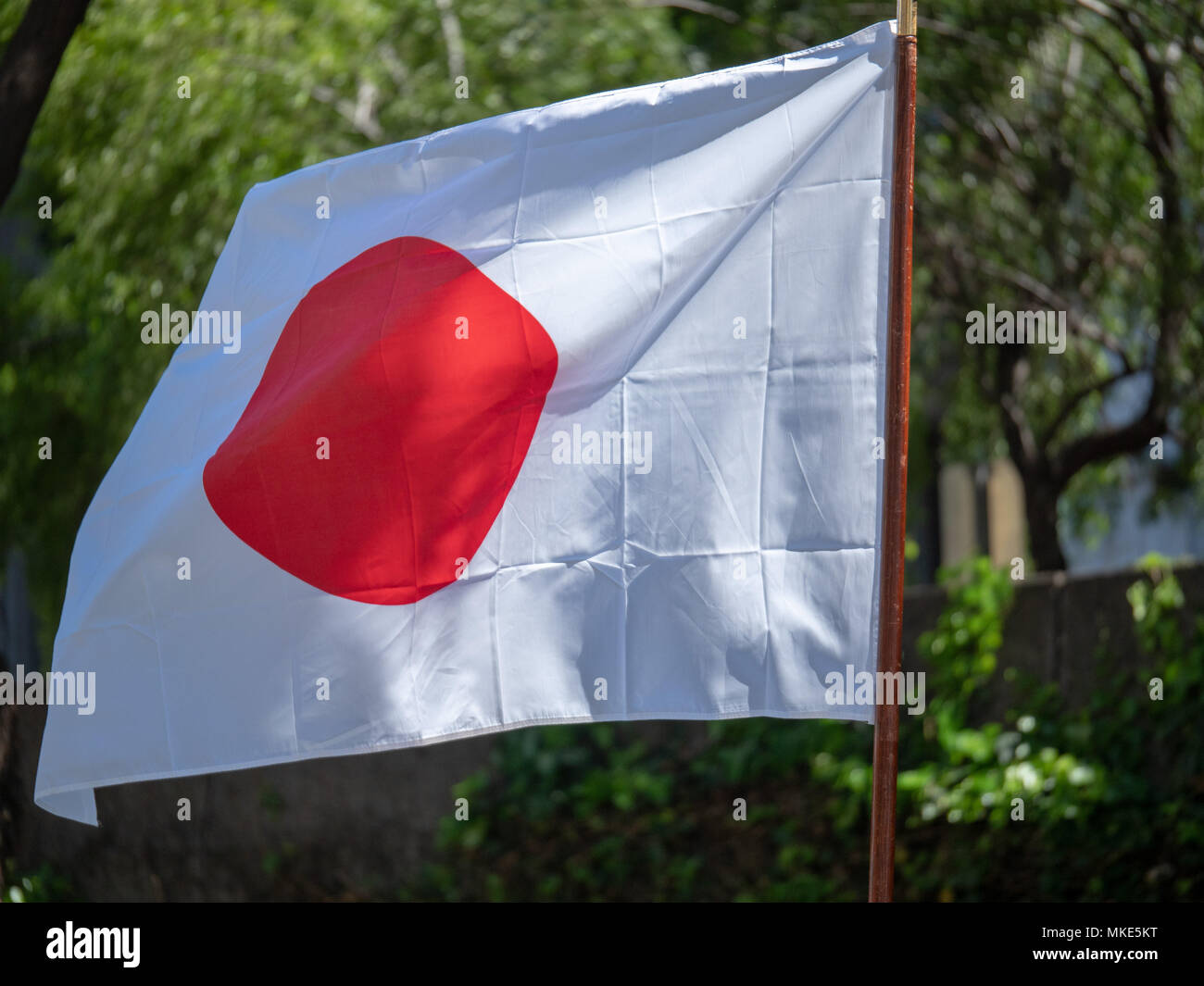 Japanese Land Of The Rising Sun Flag Waving In The Wind Stock Photo Alamy