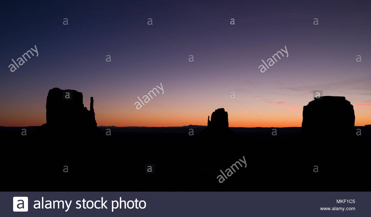From Left To Right West Mitten Butte East Mitten Butte And Merrick Butte In Monument Valley Before Sunrise Navajo County Arizona Usa Stock Photo Alamy
