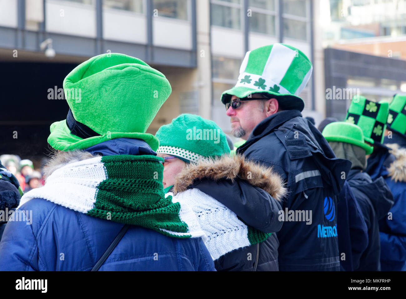 People wearing bright green hats at the Montreal St Patrick's Day