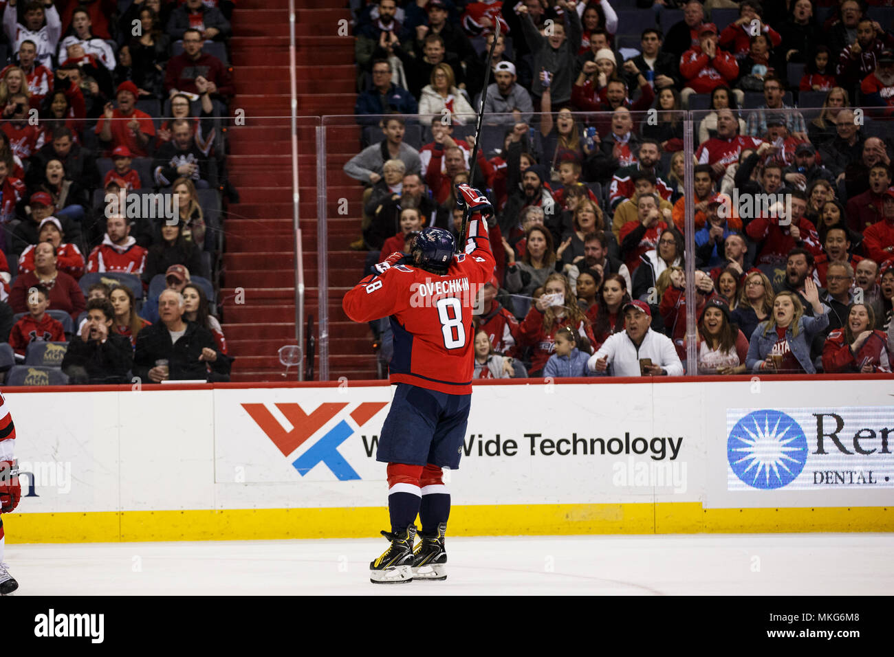 Washington Capitals left wing Alex Ovechkin (8) celebrates after scoring a goal. Stock Photo