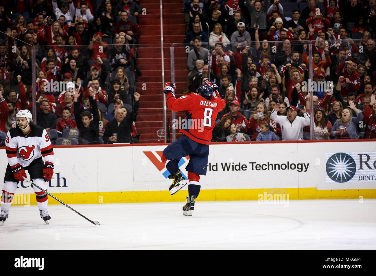 Washington Capitals left wing Alex Ovechkin (8) celebrates after scoring a goal. Stock Photo