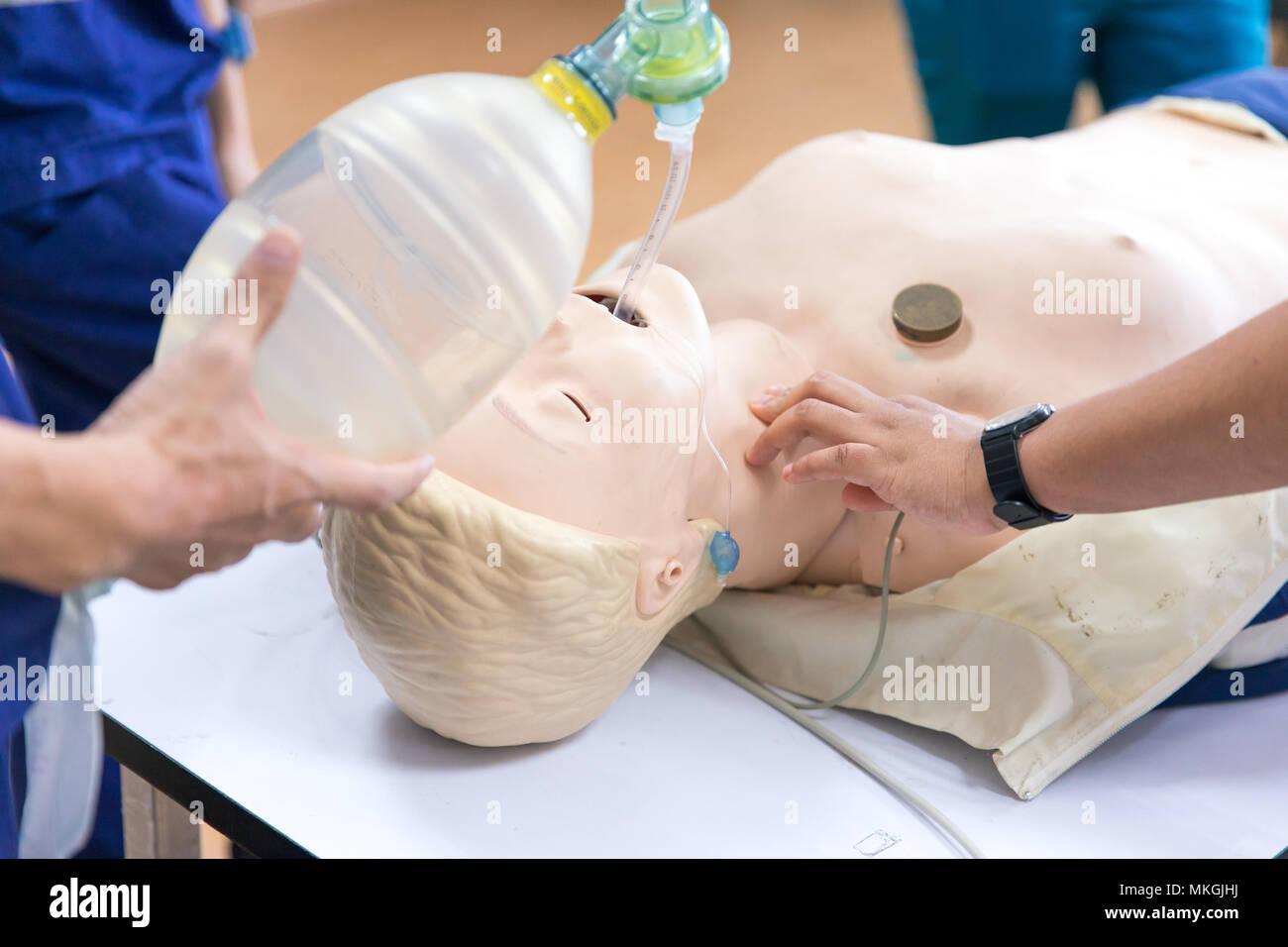CPR training medical procedure, in the class Stock Photo