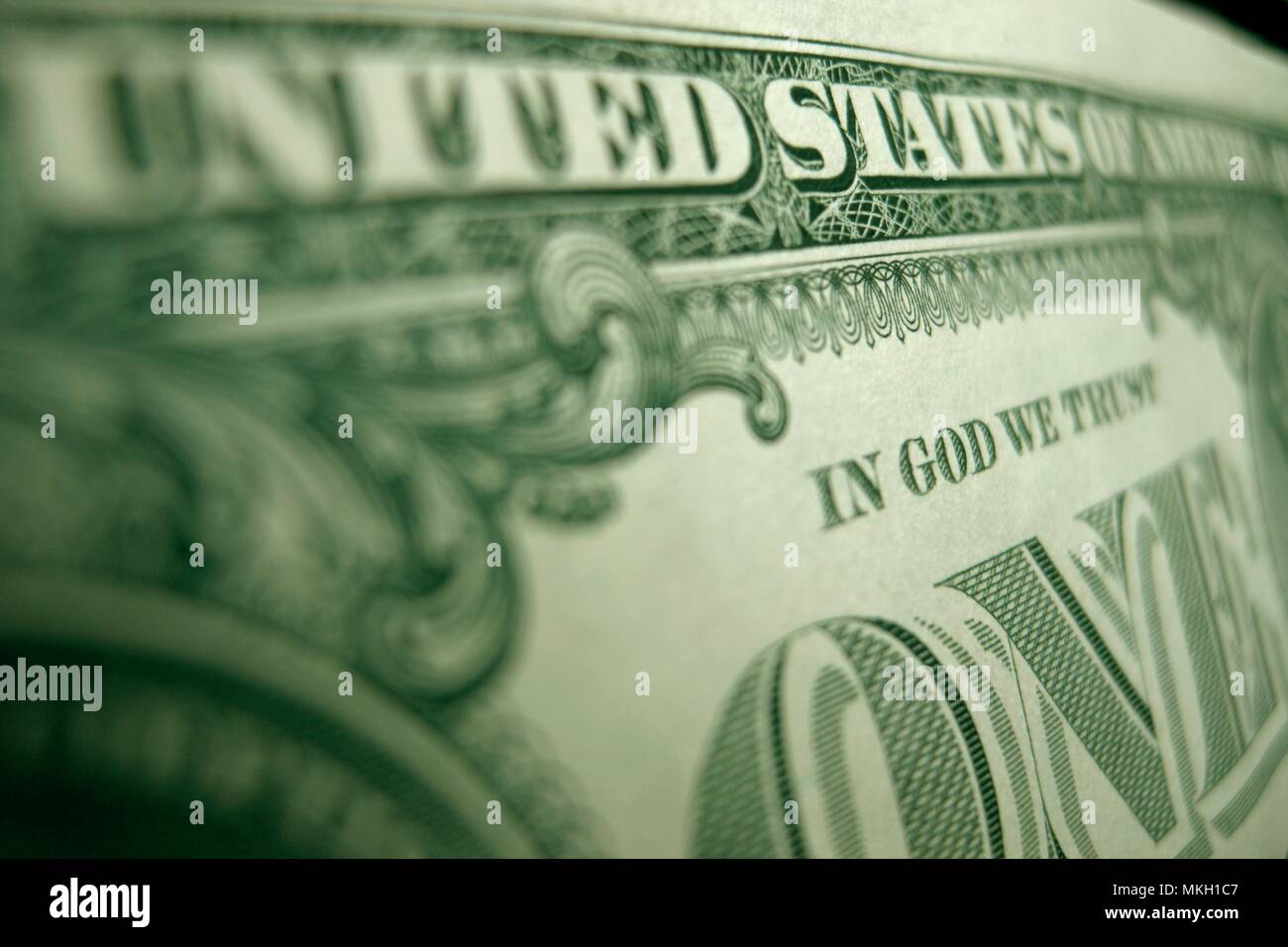 Shallow focus of the word 'GOD' on the back of a US Federal Reserve banknote. Stock Photo