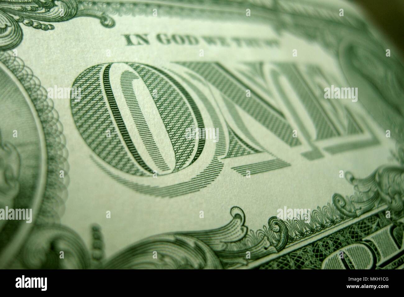 The O of the ONE is the focus of this close up of the reverse of the US dollar bill Stock Photo