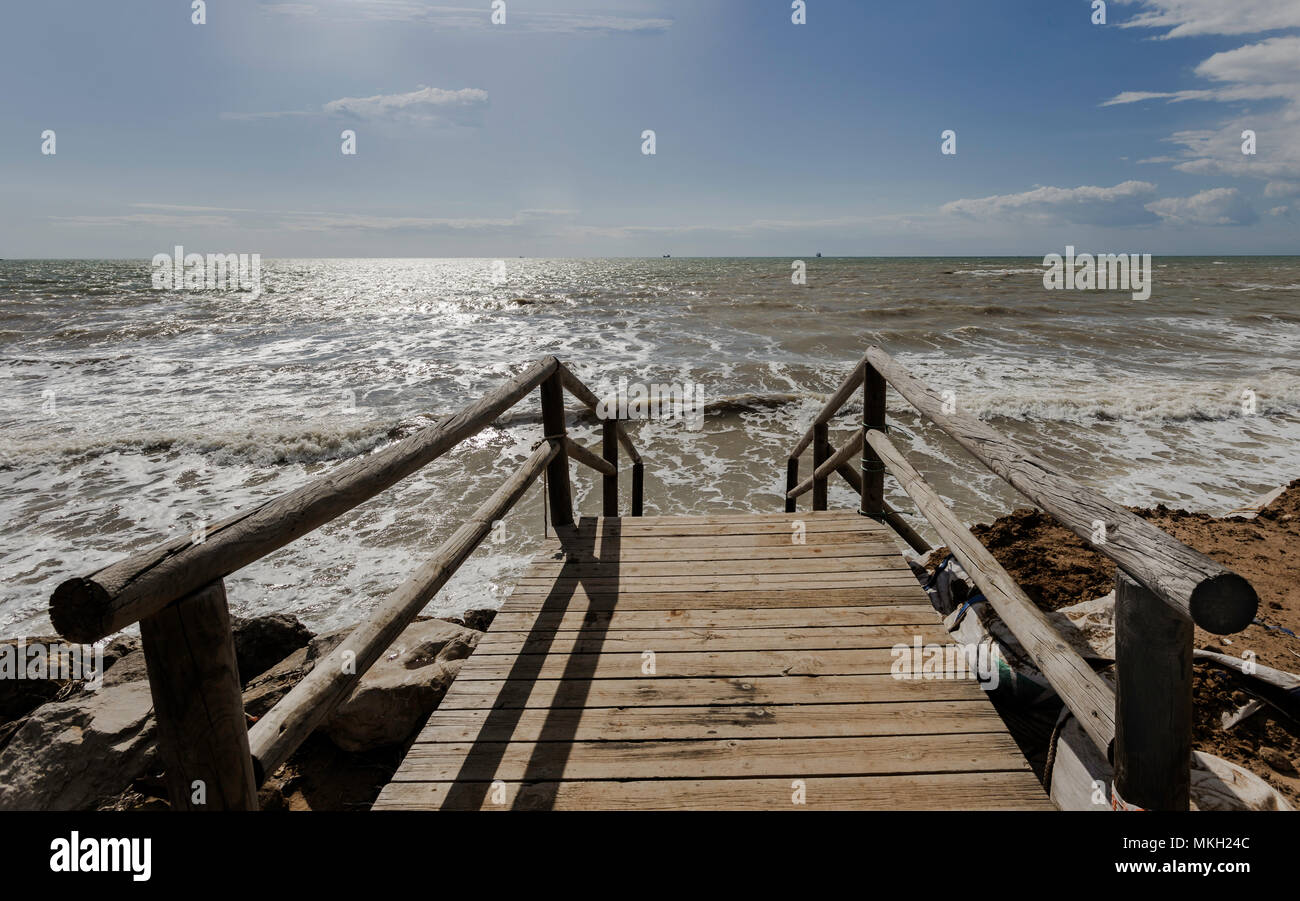 wooden jetty with the front horizon Stock Photo
