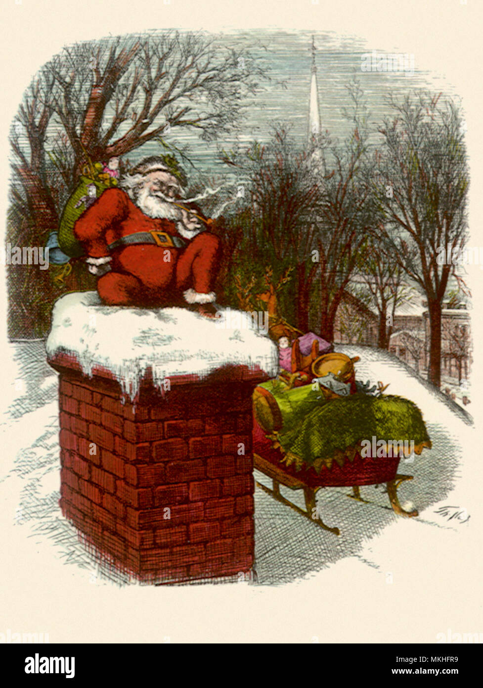 Santa sitting on Chimney Top Stock Photo