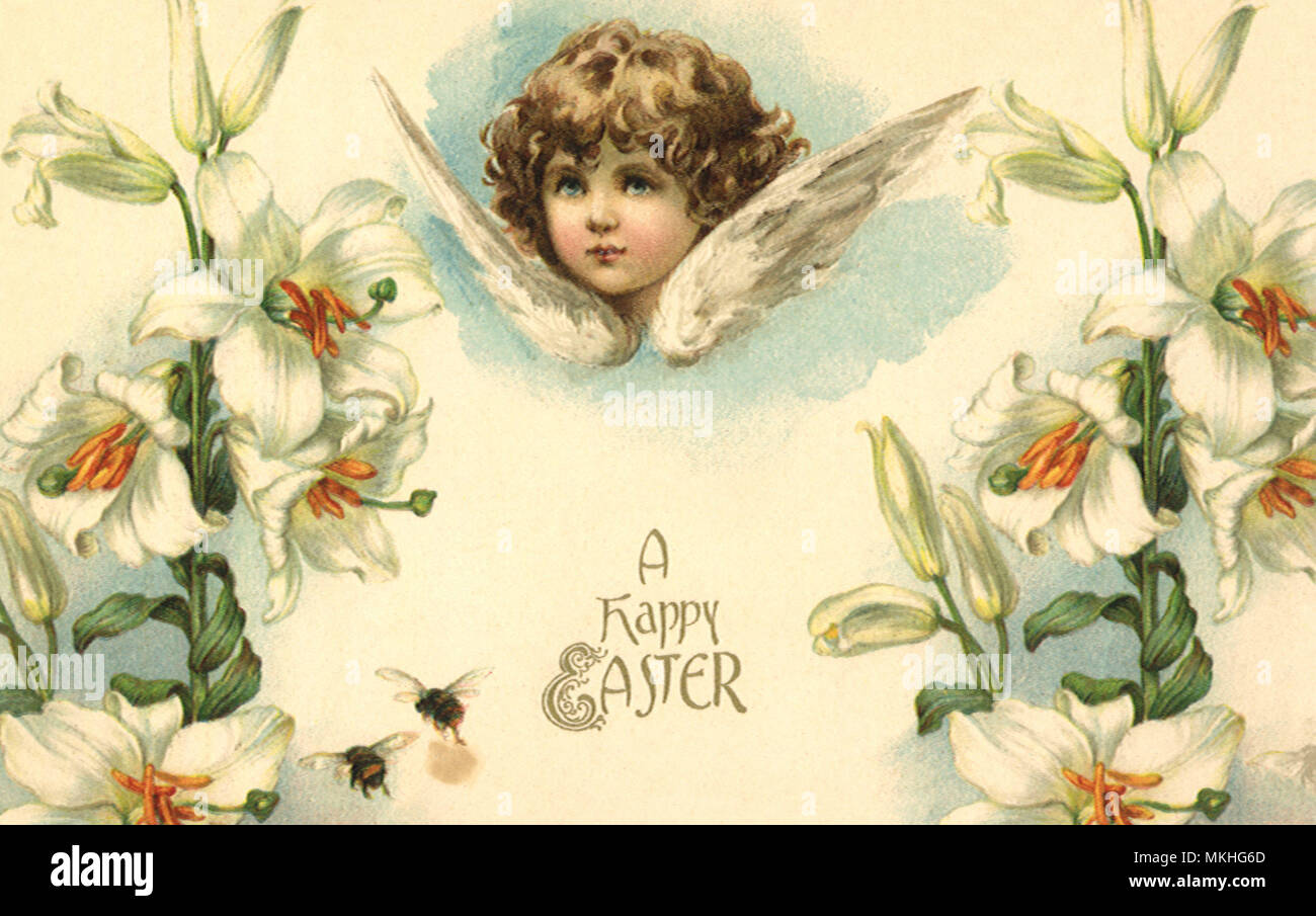 Winged Angel Head and Lilies Stock Photo