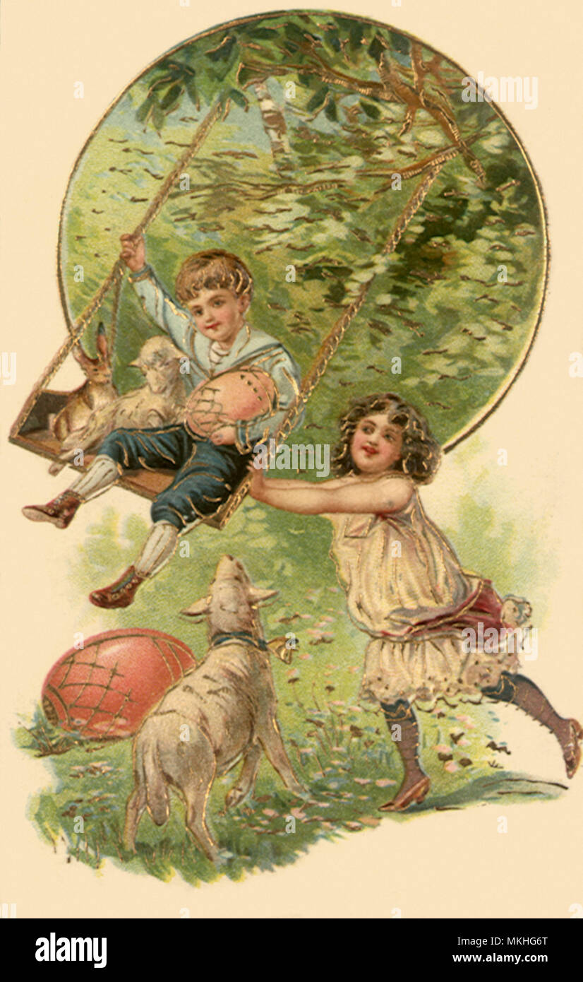 Girl Pushing Boy On Swing Stock Photo Alamy