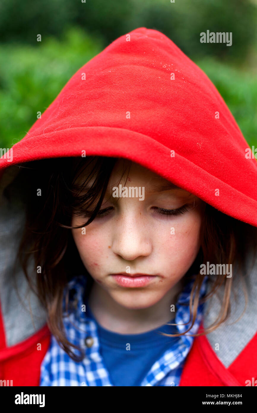 Boy wearing red hoodie Stock Photo Alamy