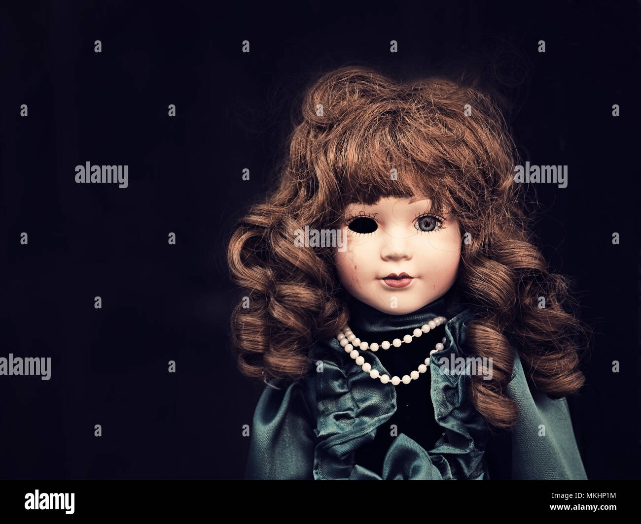 Antique porcelain baby doll with one eye,İstanbul Stock Photo