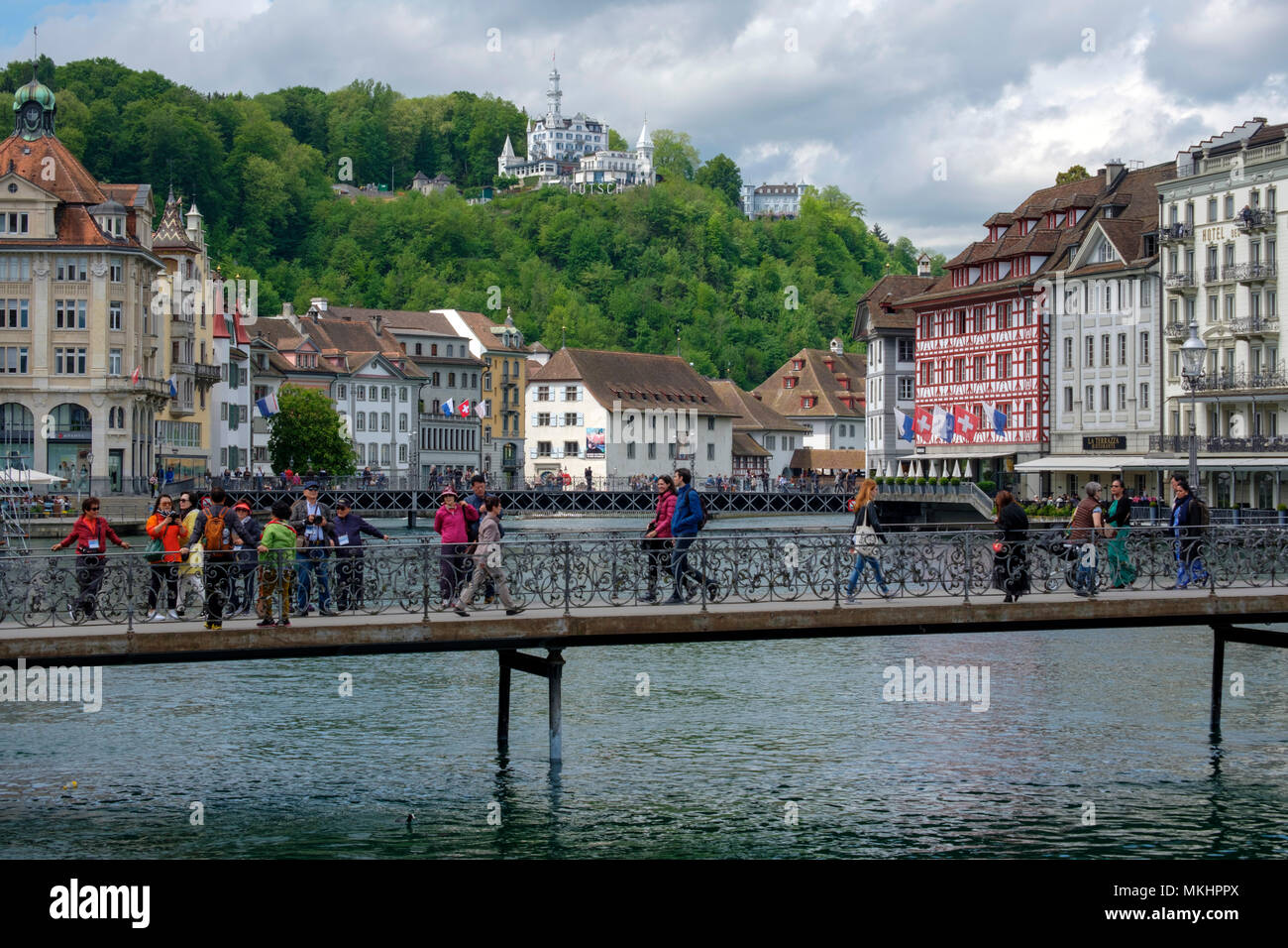 People crossing the Rathaussteg footbridge in Lucerne, Switzerland, Europe Stock Photo