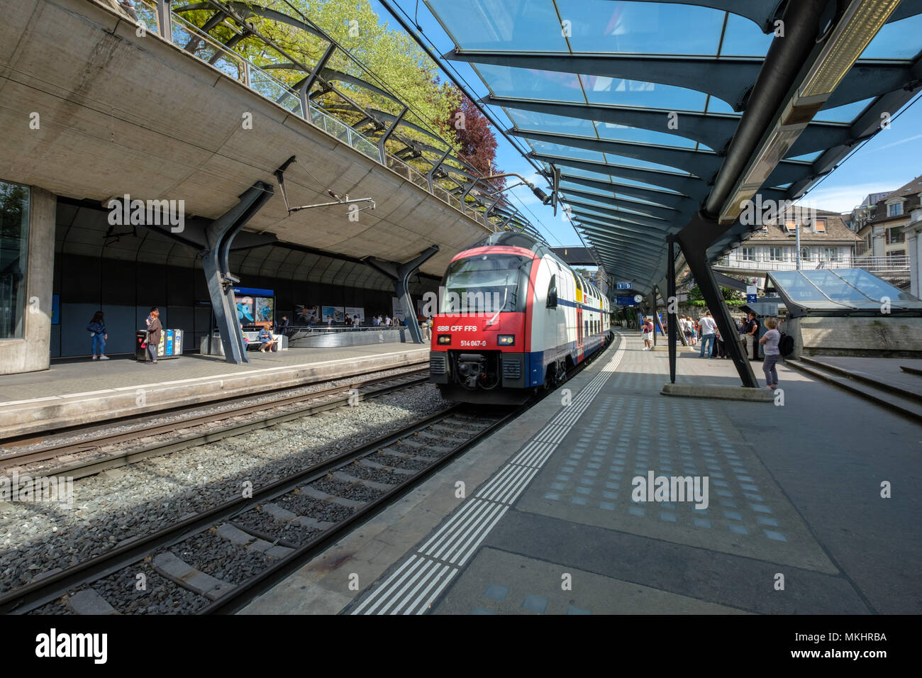 Train arriving at Zurich Stadelholfen railway station in Zurich, Switzerland, Europe Stock Photo