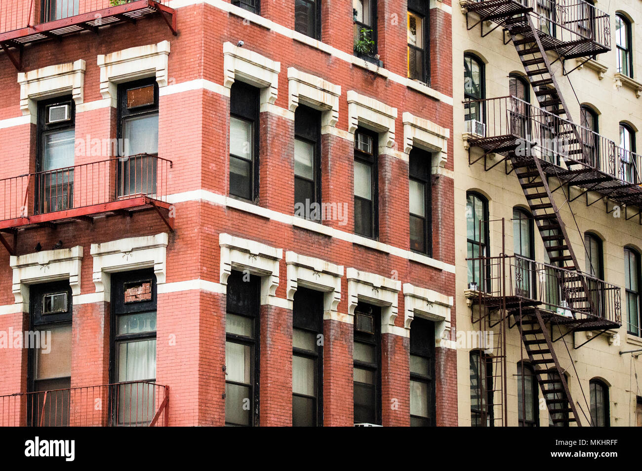Closeup view of New York City style apartment buildings with emergency