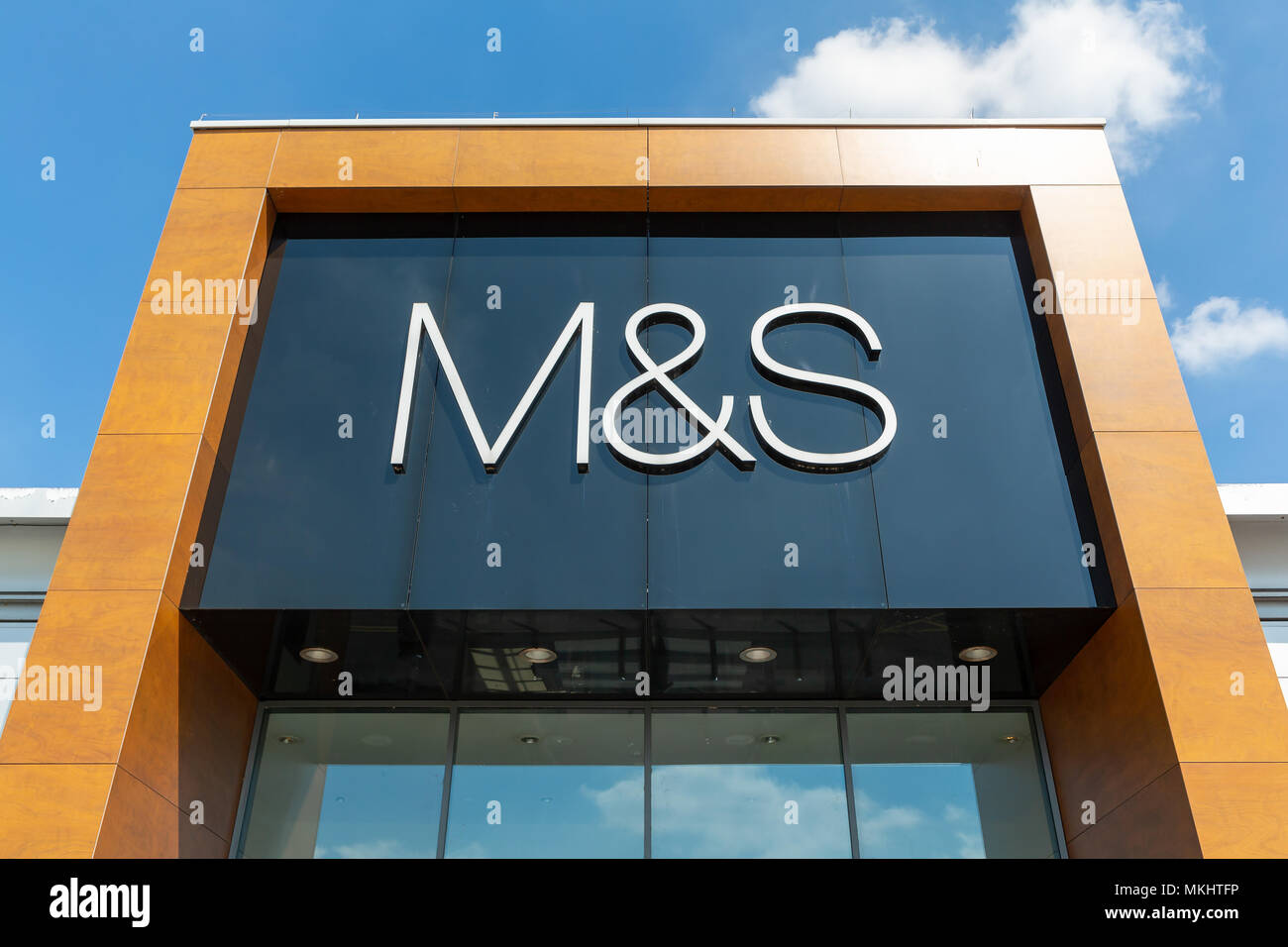 Sunday 06 May 2018 Store logo above the side entrance at Marks and