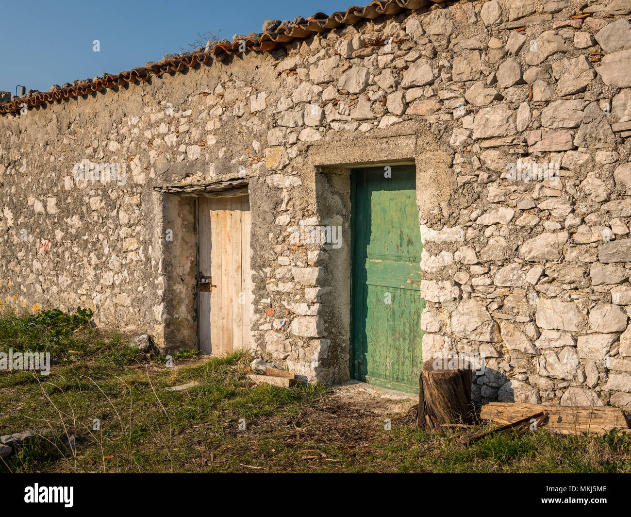 Stone house with two old wooden doors in Croatia (Island Cres Stock ...