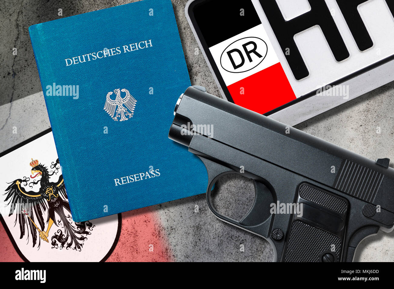 Reich Citizenship Passport, number plate, a Photo icon and weapon, Reichsbürger-Pass, Nummernschild und Waffe, Symbolfoto Stock Photo