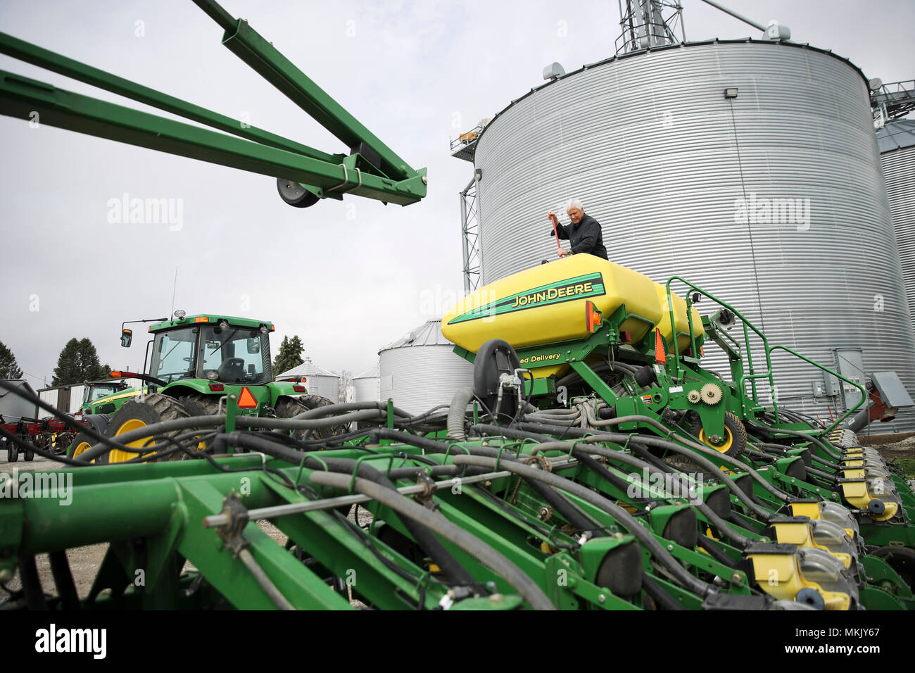 (180509) -- IOWA, May 9, 2018 (Xinhua) -- Rick Kimberley checks a farming combine machine at his farm near Des Moines, capital of Iowa State, May 3, 2018. Rick and his son, Grant, grow more than 4,000 acres of corn and soybeans with a couple of hired hands and massive combines whose computers precisely track yield, moisture and other key statistics for each row and acre. He has been to China 15 times in recent years to talk about precision farming and other tricks of his trade, becoming an ambassador for modern farming methods in China. As for the current trade tensions between the United Stat Stock Photo