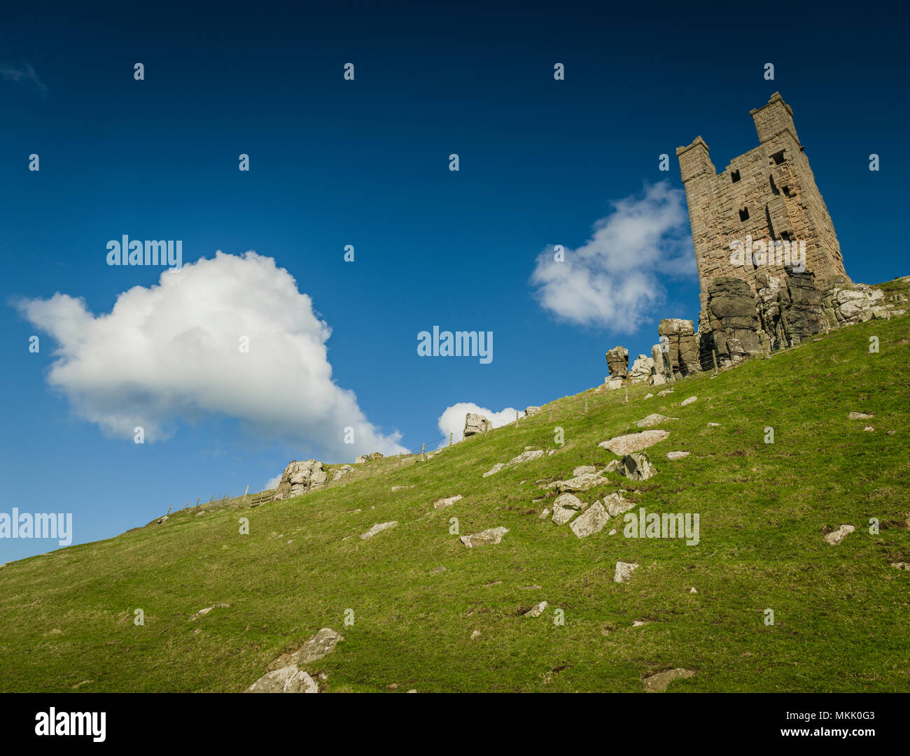 Lilburn Tower, Dunstanburgh Castle, Northumberland, UK. Stock Photo