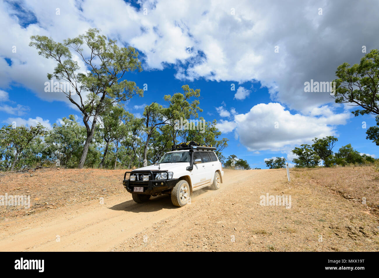 4x4 Nissan Patrol car driving off-road on a dirt track going towards Maytown, Far North Queensland, FNQ, QLD, Australia Stock Photo