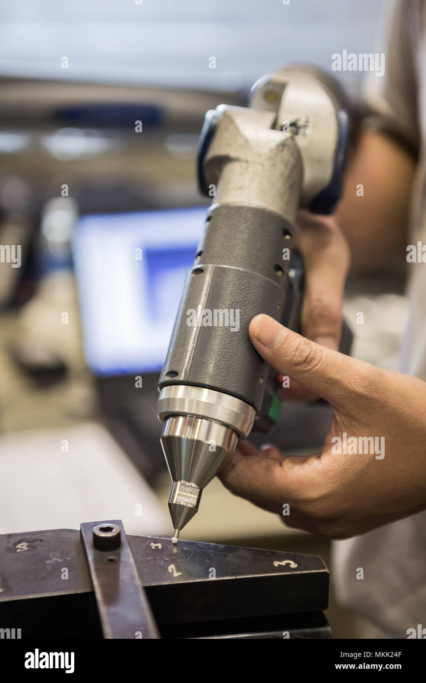 Inspection is check gap and dimension part in car factory Stock Photo ...
