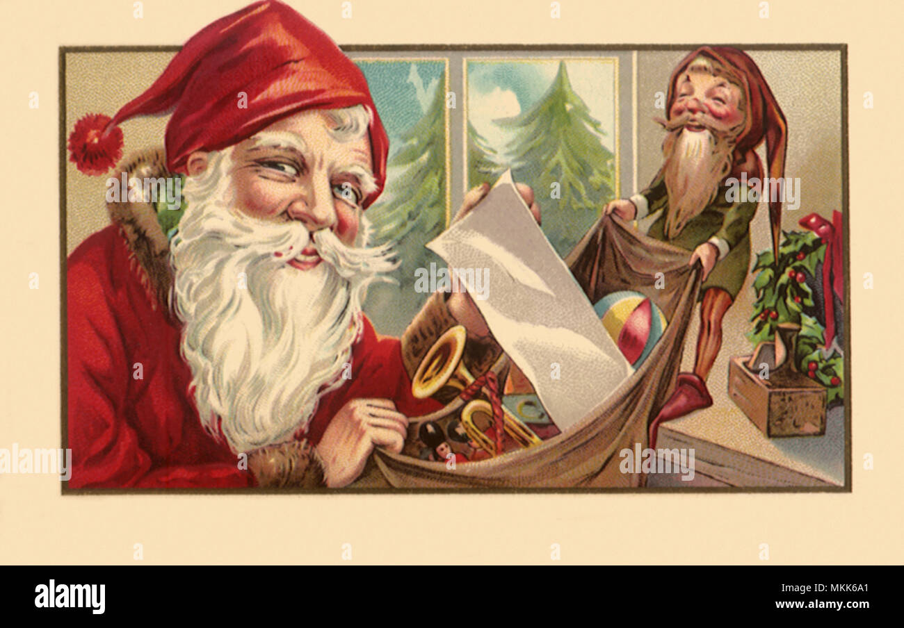 Santa, Elf, and Toys Stock Photo