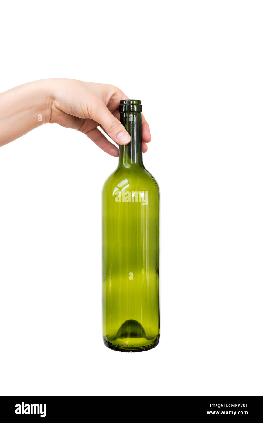 Female hand holding empty glass bottle isolated on white. Recyclable